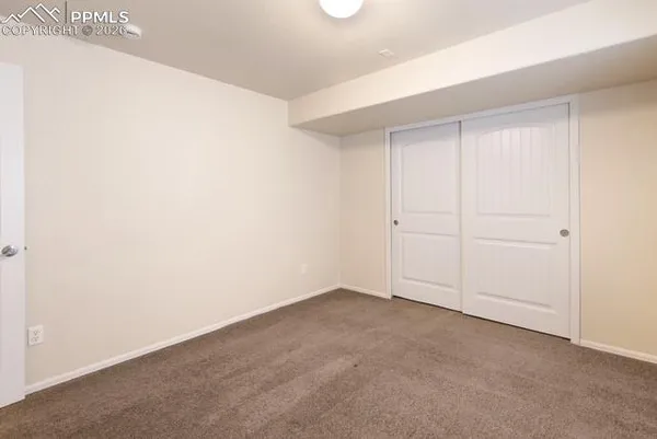 an empty room with an entryway