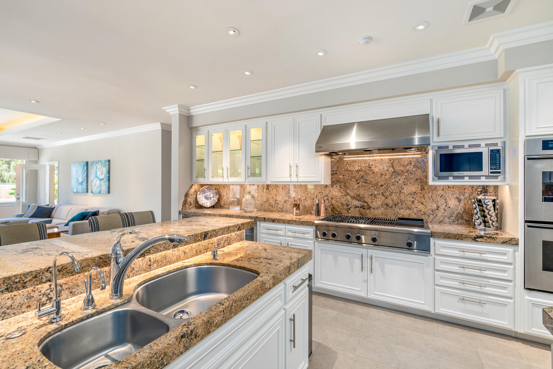 34777 Via Josefina Rancho Mirage, CA 92270 - Photo 14 of 47 a kitchen with stainless steel appliances granite countertop a sink and cabinets