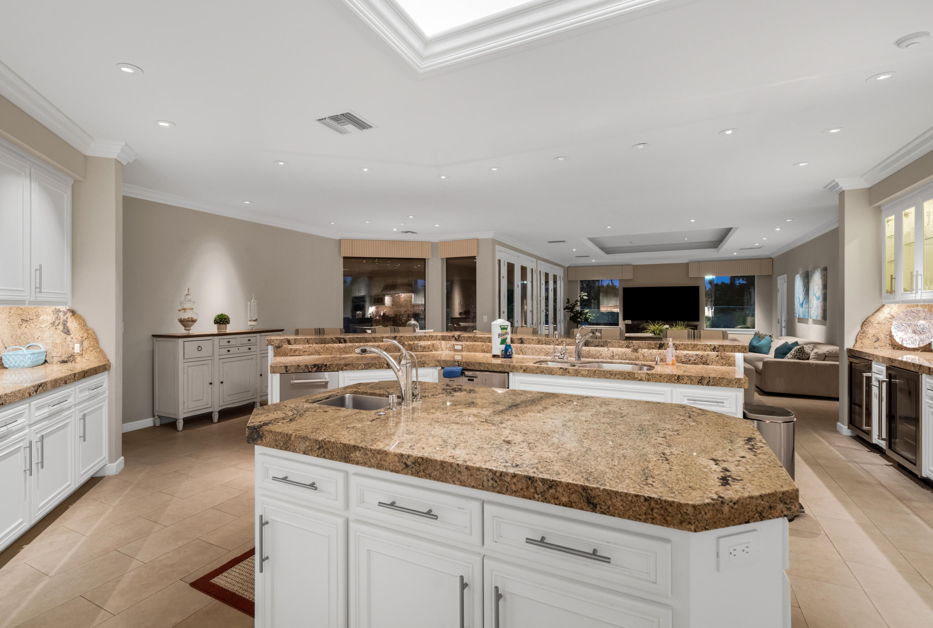 34777 Via Josefina Rancho Mirage, CA 92270 - Photo 17 of 47 a view of living room kitchen with granite countertop stainless steel appliances and sink