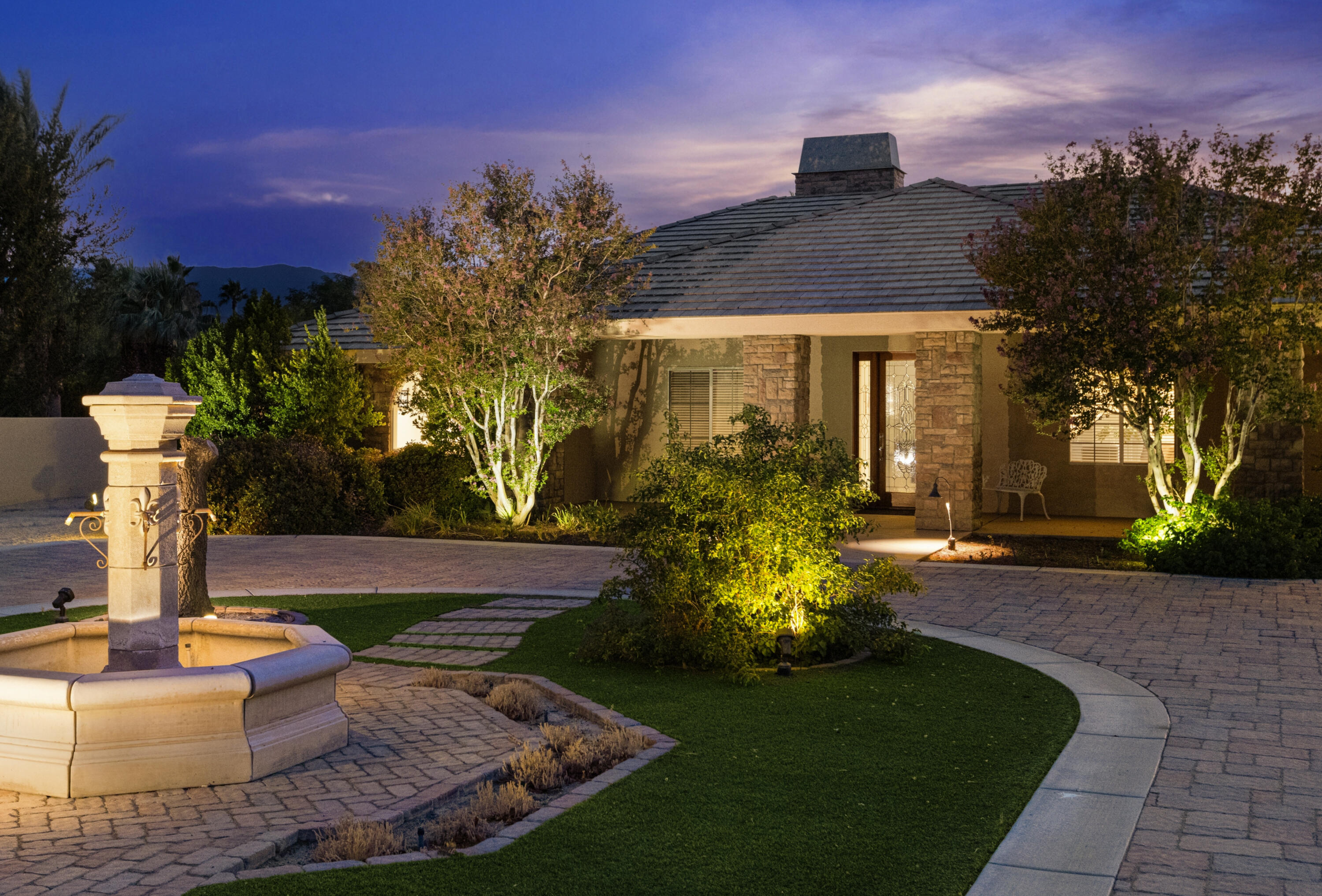 34777 Via Josefina Rancho Mirage, CA 92270 - Photo 3 of 47 a front view of a house with garden