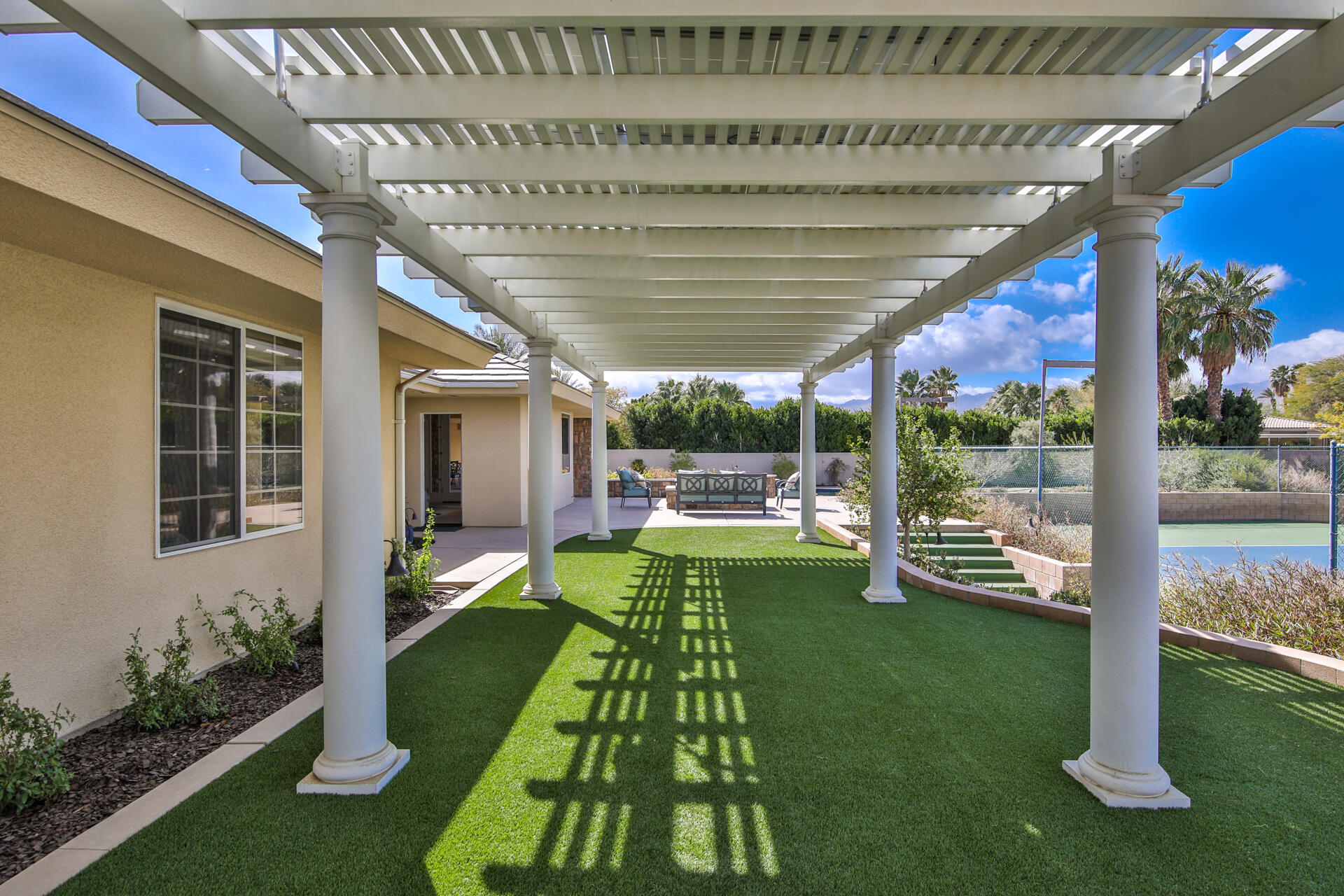 34777 Via Josefina Rancho Mirage, CA 92270 - Photo 9 of 47 a front view of a house with a yard balcony