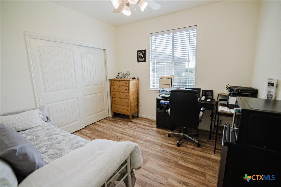 201 Boulder Ridge Drive Cuero, TX 77954 - Photo 26 of 37 a view of a livingroom with workspace and a window
