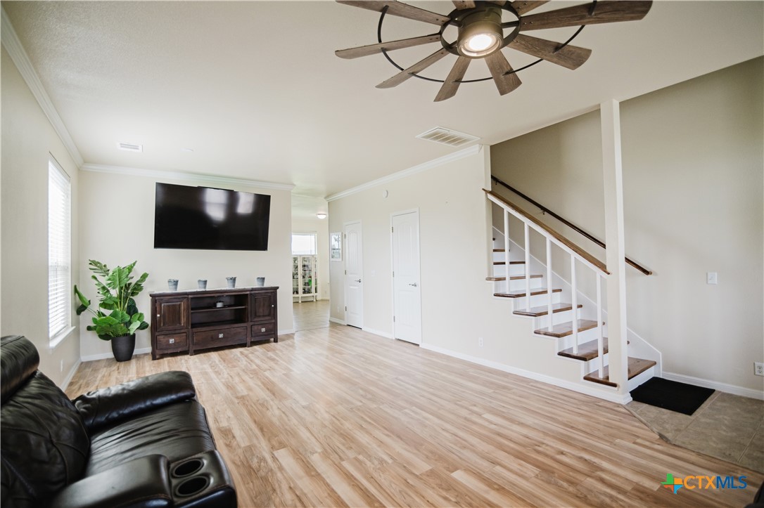 201 Boulder Ridge Drive Cuero, TX 77954 - Photo 6 of 37 a living room with furniture and a flat screen tv