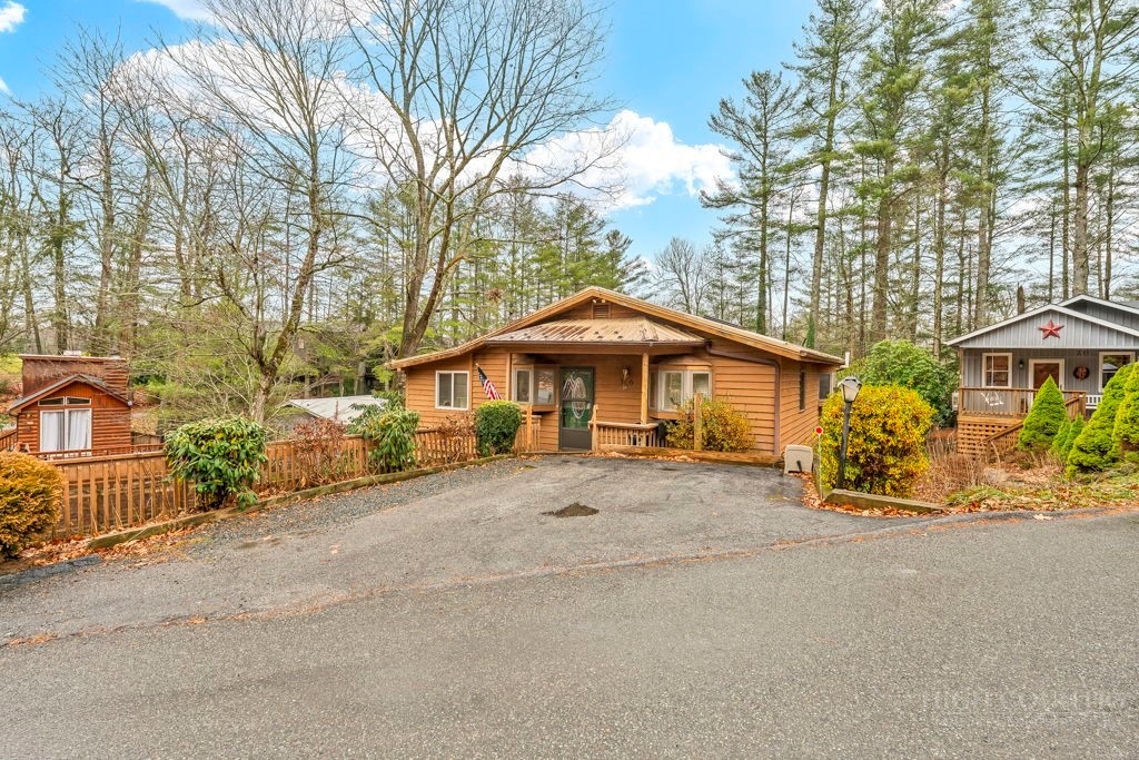 36 Larkspur Road Newland, NC 28657 - Photo 2 of 36 a view of a house with a yard and tree s