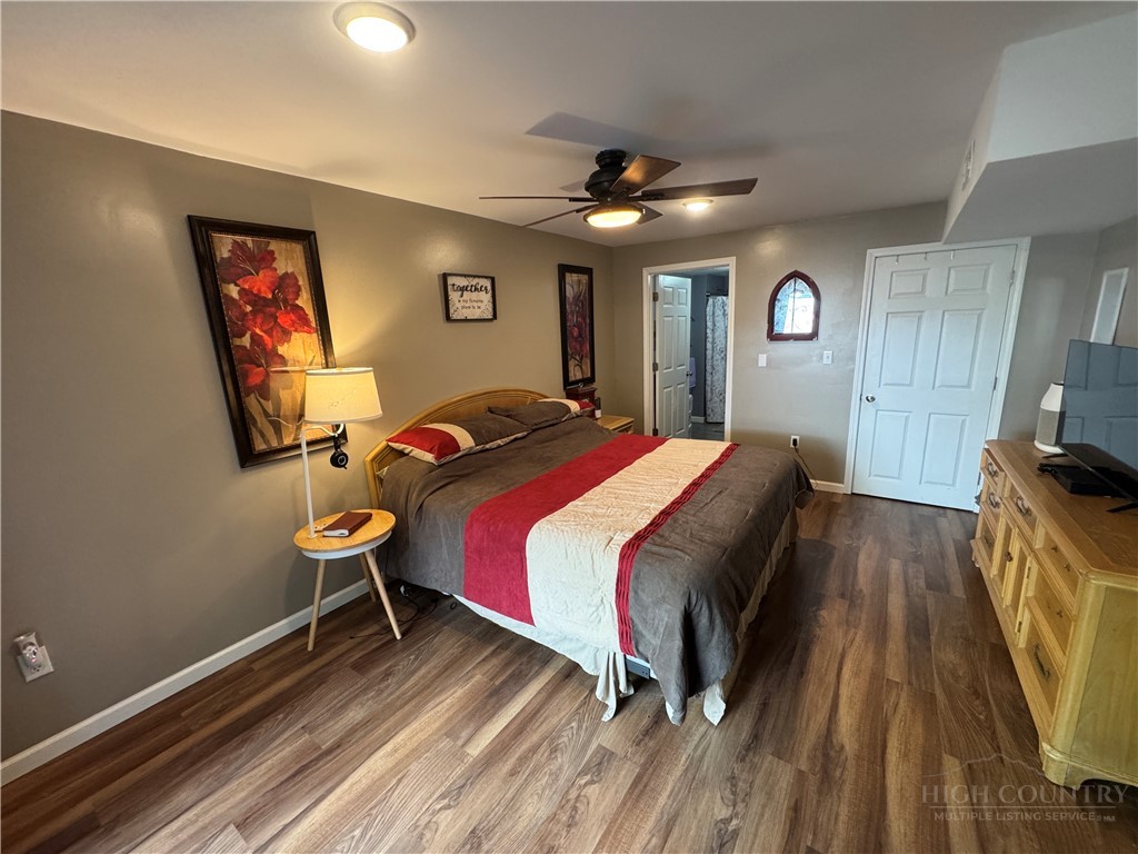36 Larkspur Road Newland, NC 28657 - Photo 22 of 36 a bed room with a bed and a tv