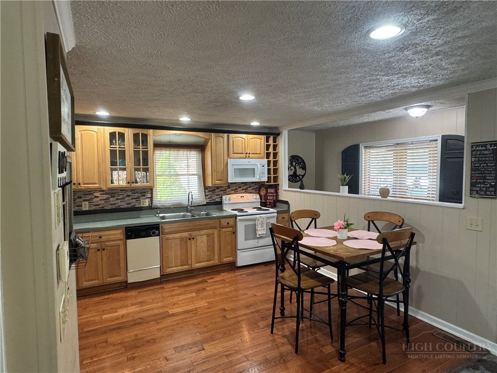 36 Larkspur Road Newland, NC 28657 - Photo 5 of 36 a kitchen with a table and chairs in it