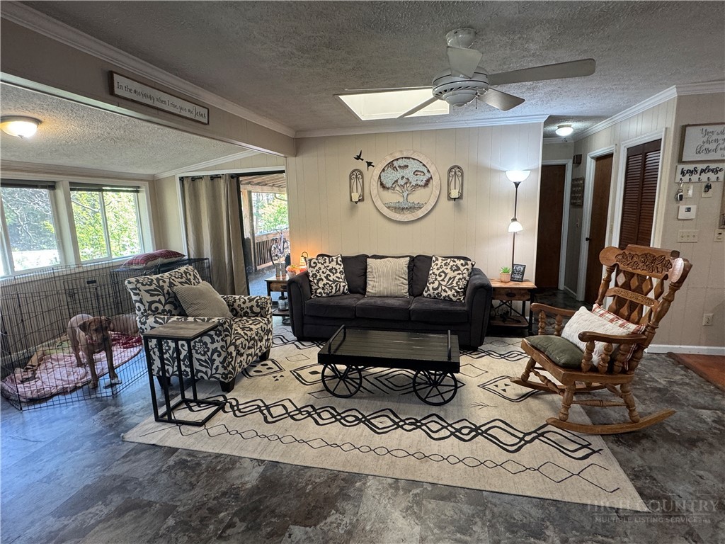 36 Larkspur Road Newland, NC 28657 - Photo 6 of 36 a living room with furniture and a large window