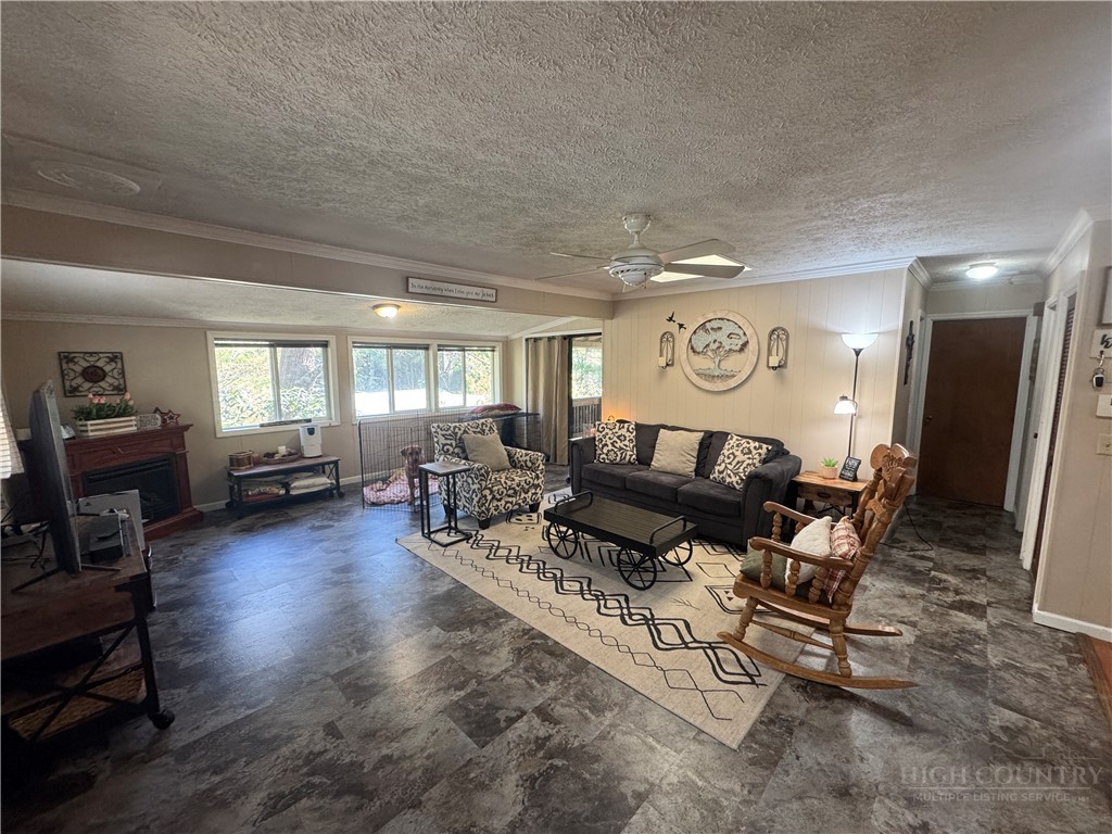 36 Larkspur Road Newland, NC 28657 - Photo 7 of 36 a living room with furniture and wooden floor