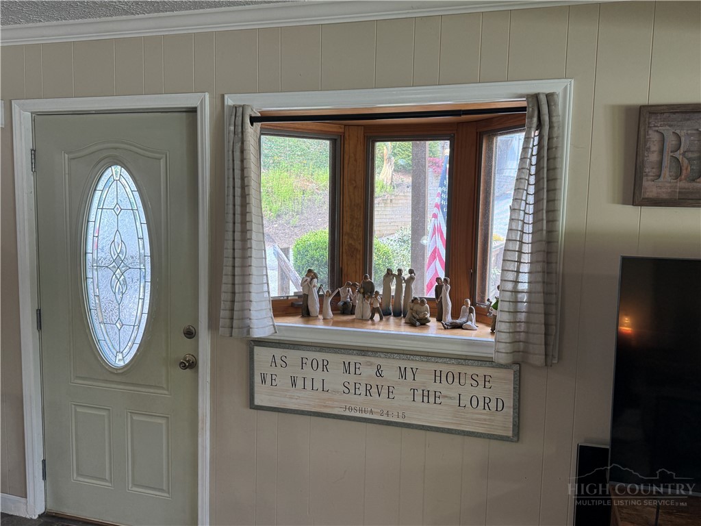 36 Larkspur Road Newland, NC 28657 - Photo 9 of 36 a view of a entryway door with wooden floor