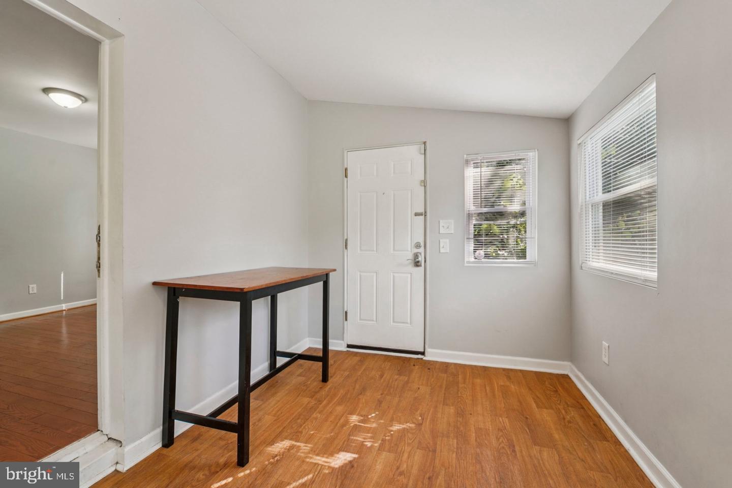 4511 Prospect Circle Baltimore, MD 21216 - Photo 15 of 25 a view of empty room with wooden floor