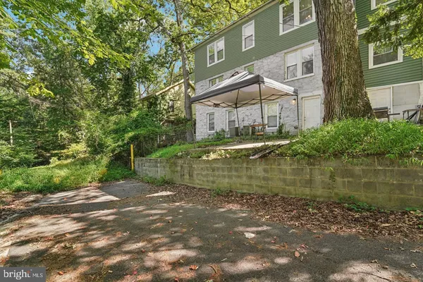 a view of a lake with a building in the background
