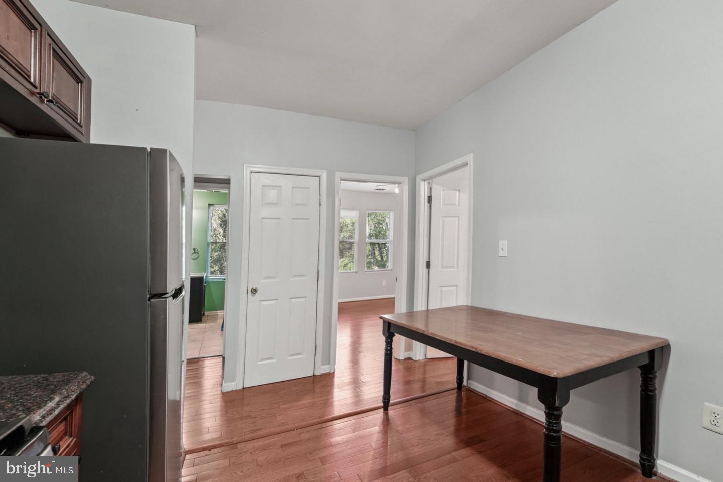 4511 Prospect Circle Baltimore, MD 21216 - Photo 8 of 25 a view of a livingroom with furniture and wooden floor