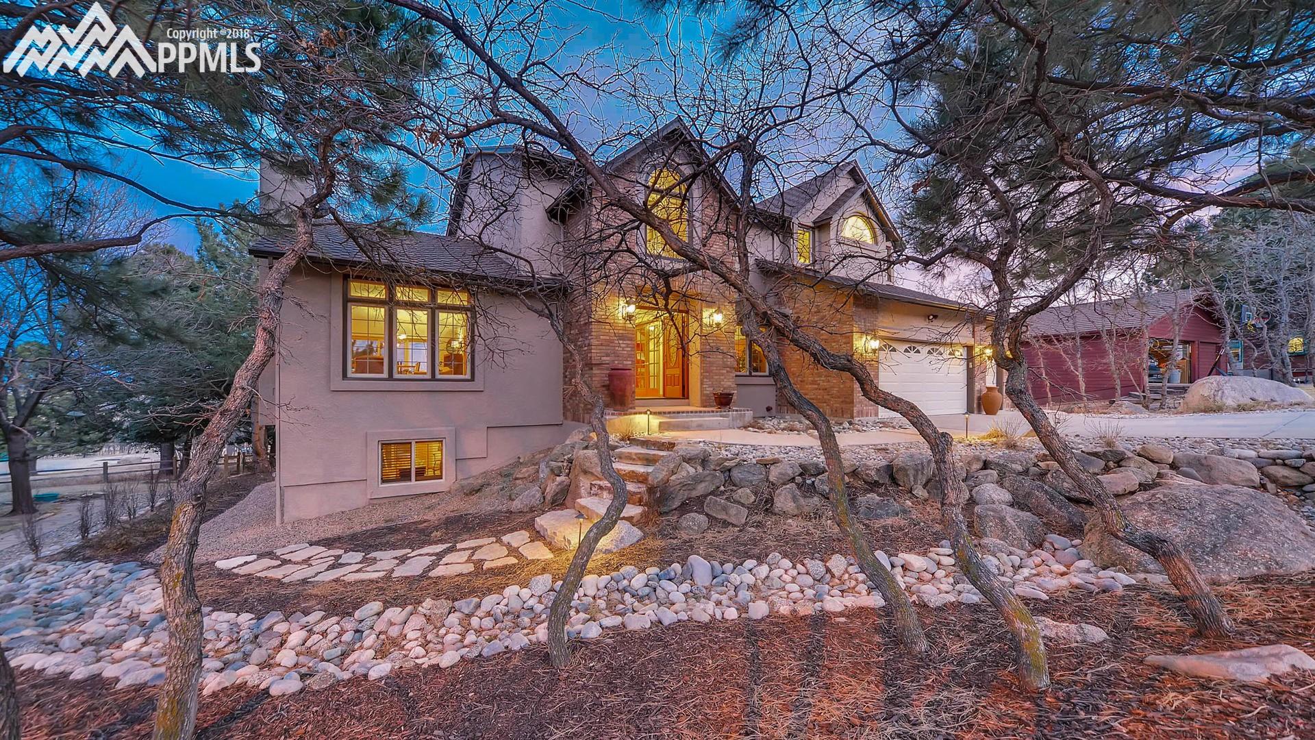 Front of Home with Amazing Landscaping