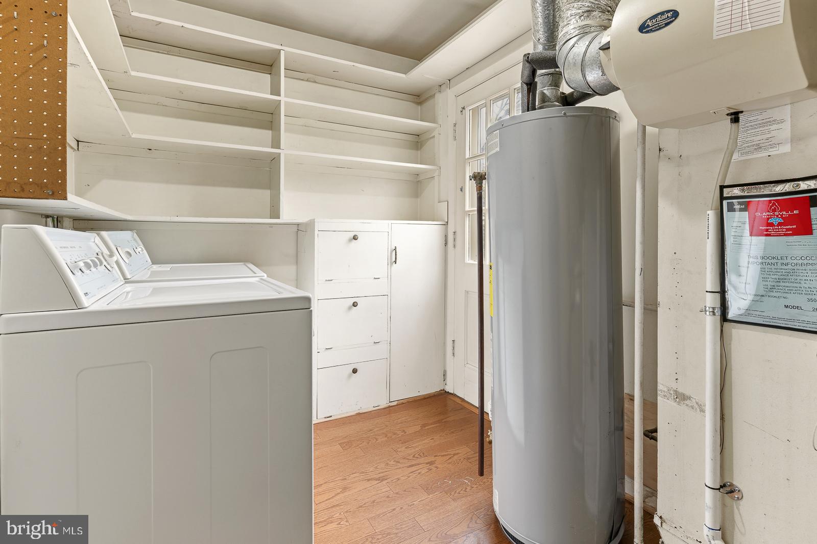 8714 Granite Lane Laurel, MD 20708 - Photo 16 of 32 Laundry Room with Hot Water Heater and HVAC