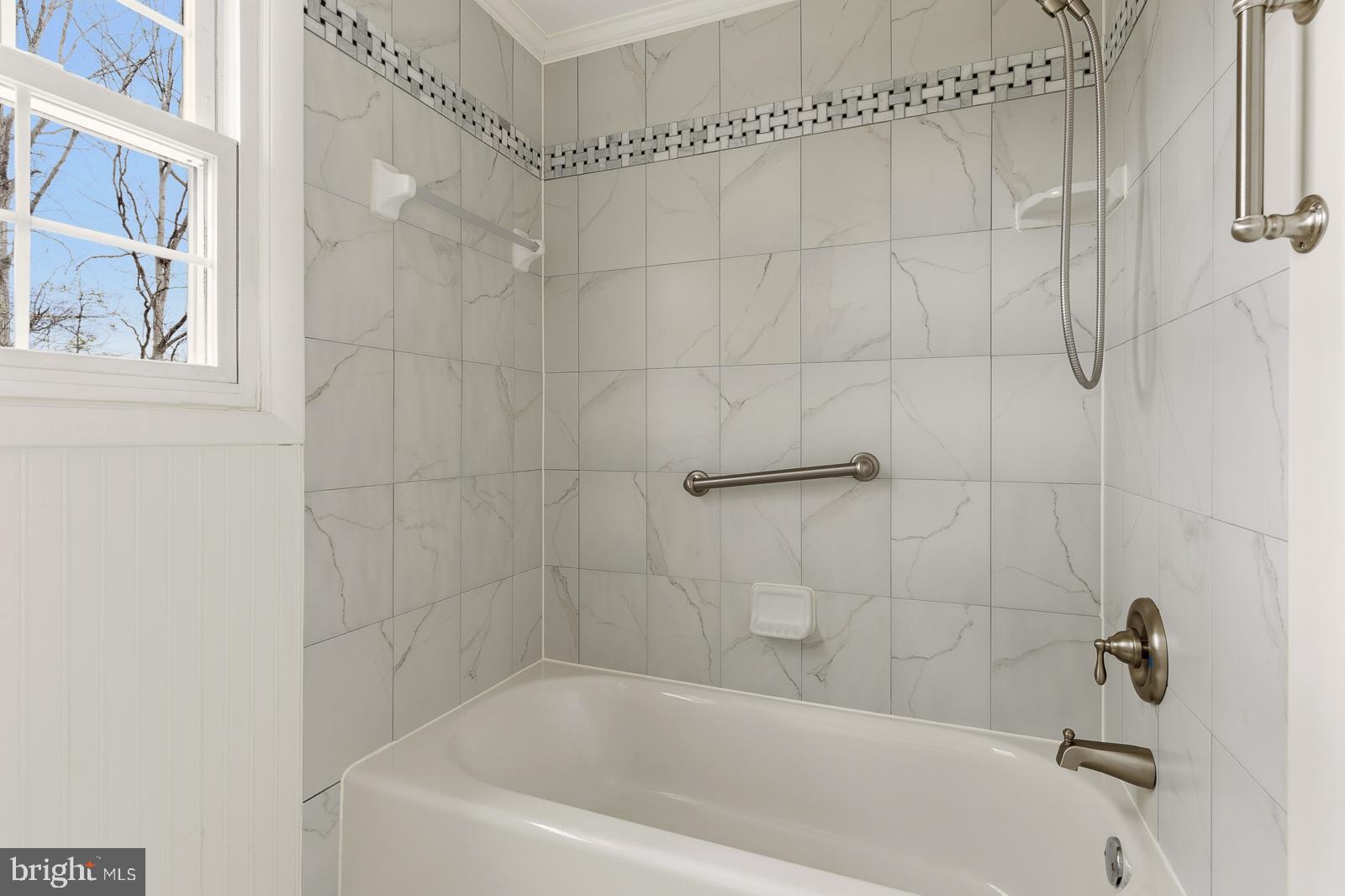 8714 Granite Lane Laurel, MD 20708 - Photo 25 of 35 a bathroom with a bathtub