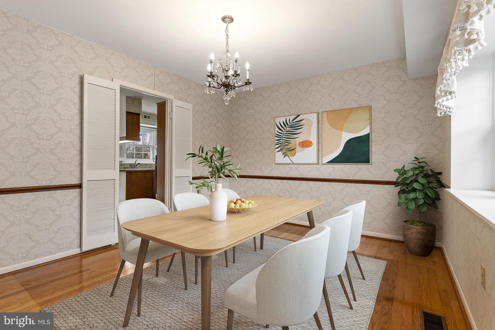 8714 Granite Lane Laurel, MD 20708 - Photo 9 of 35 a view of a dining room with furniture and chandelier