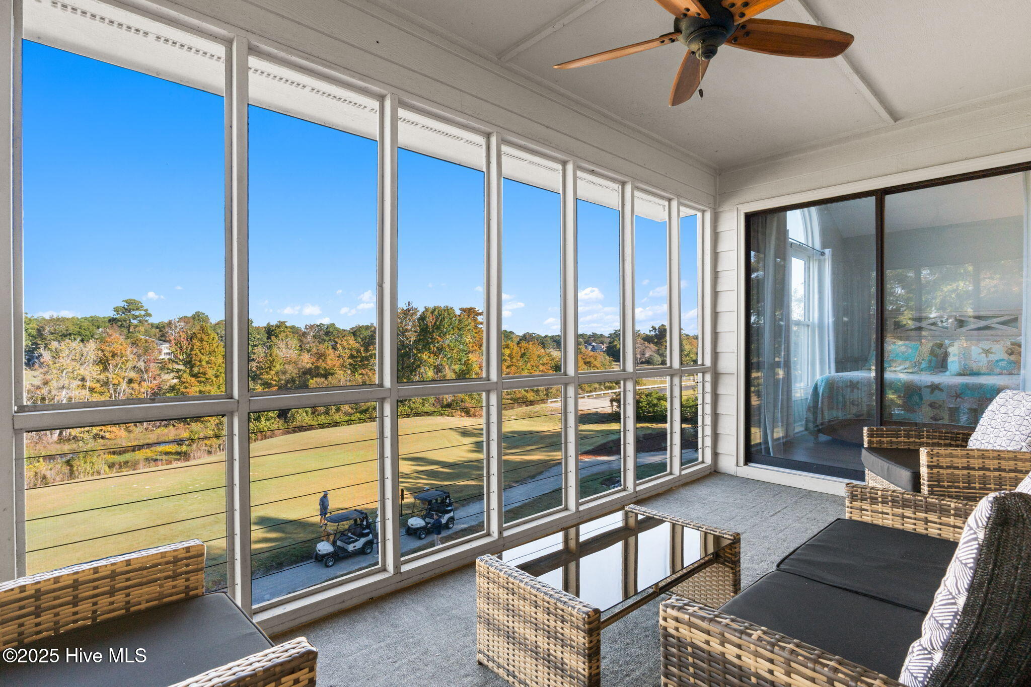 213 Clubhouse Road, Unit 105 Sunset Beach, NC 28468 - Photo 18 of 36 main screened in balony porch overlookin