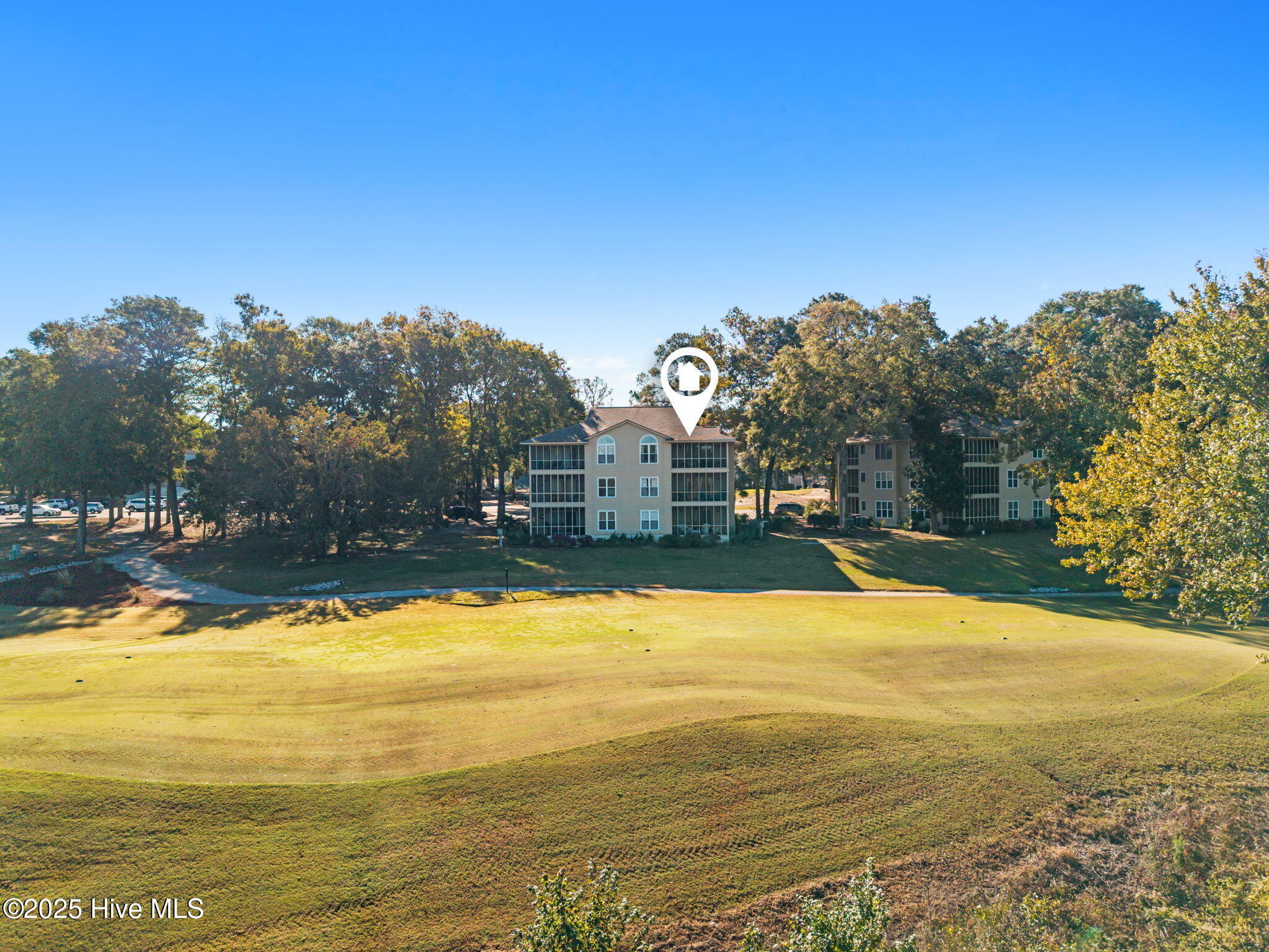 213 Clubhouse Road, Unit 105 Sunset Beach, NC 28468 - Photo 28 of 36 Back
