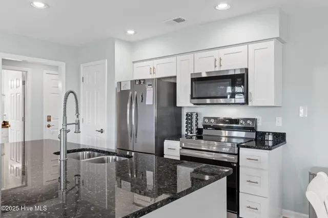 $329,000 | 213 Clubhouse Road, Unit 105, Sunset Beach, NC 28468