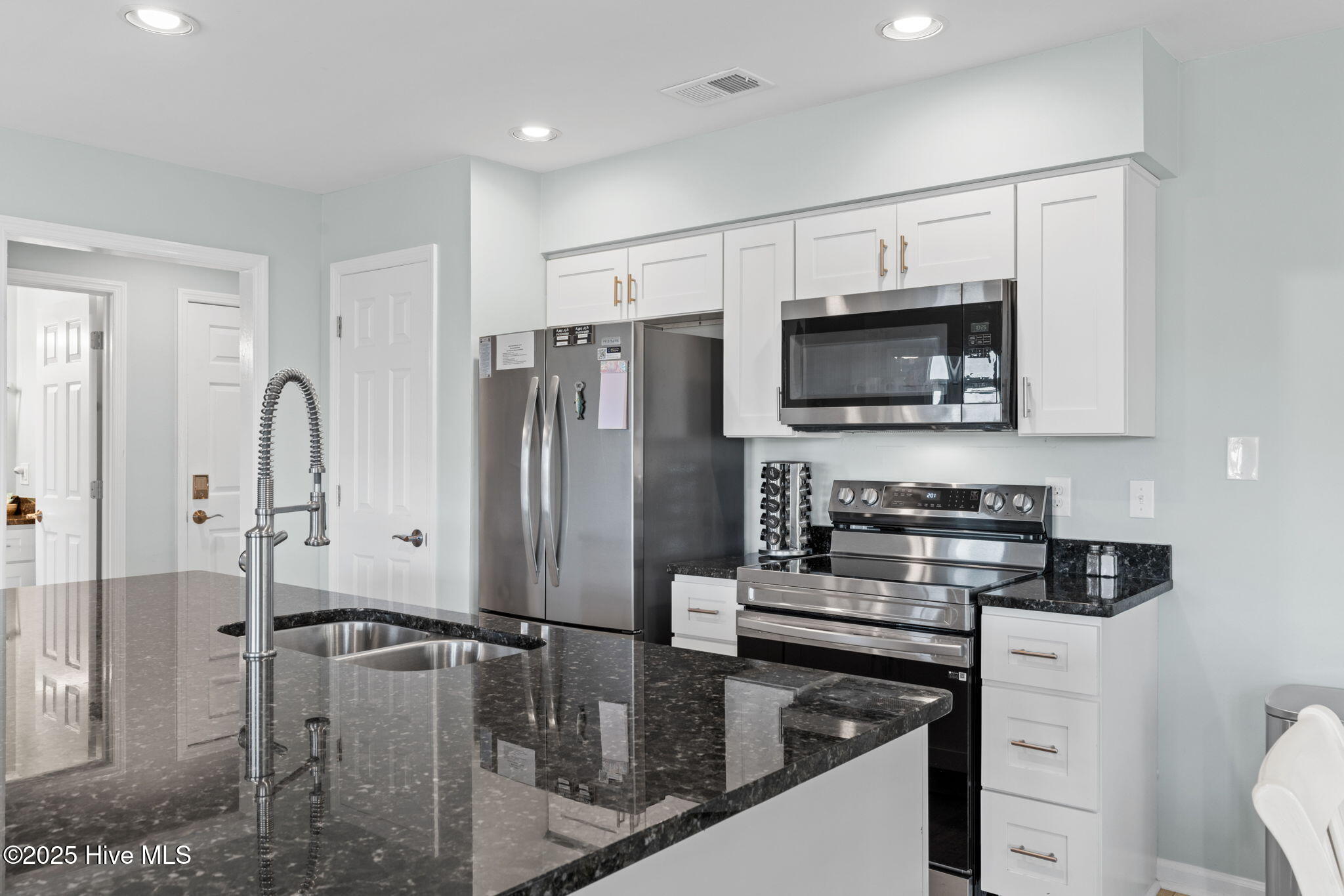 213 Clubhouse Road, Unit 105 Sunset Beach, NC 28468 - Photo 6 of 36 kitchen with large island