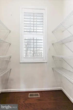 a view of a room with racks on the wall