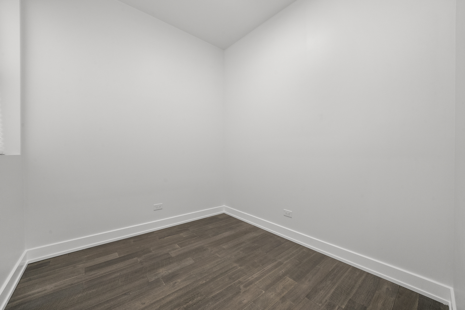 3824 West Fulton Street Chicago, IL 60624 - Photo 15 of 30 a view of an empty room with wooden floor