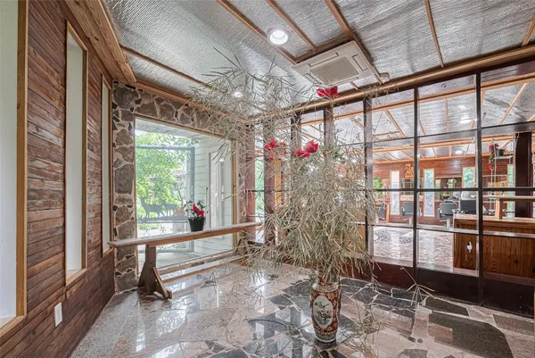 a room with window and furniture