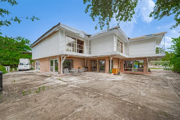 a front view of a house with yard