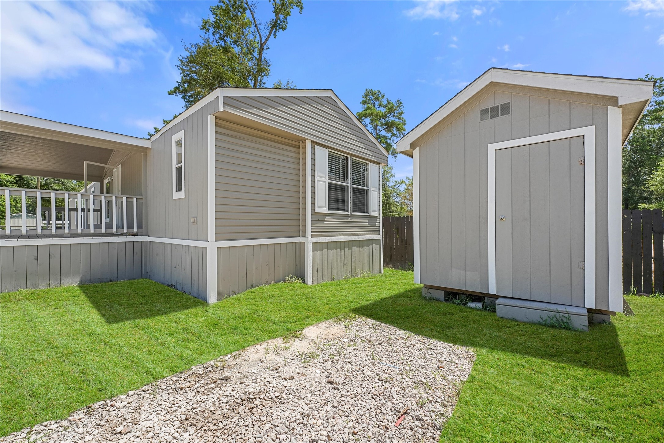 21864 Russell Drive New Caney, TX 77357 - Photo 15 of 15 a front view of a house with a yard
