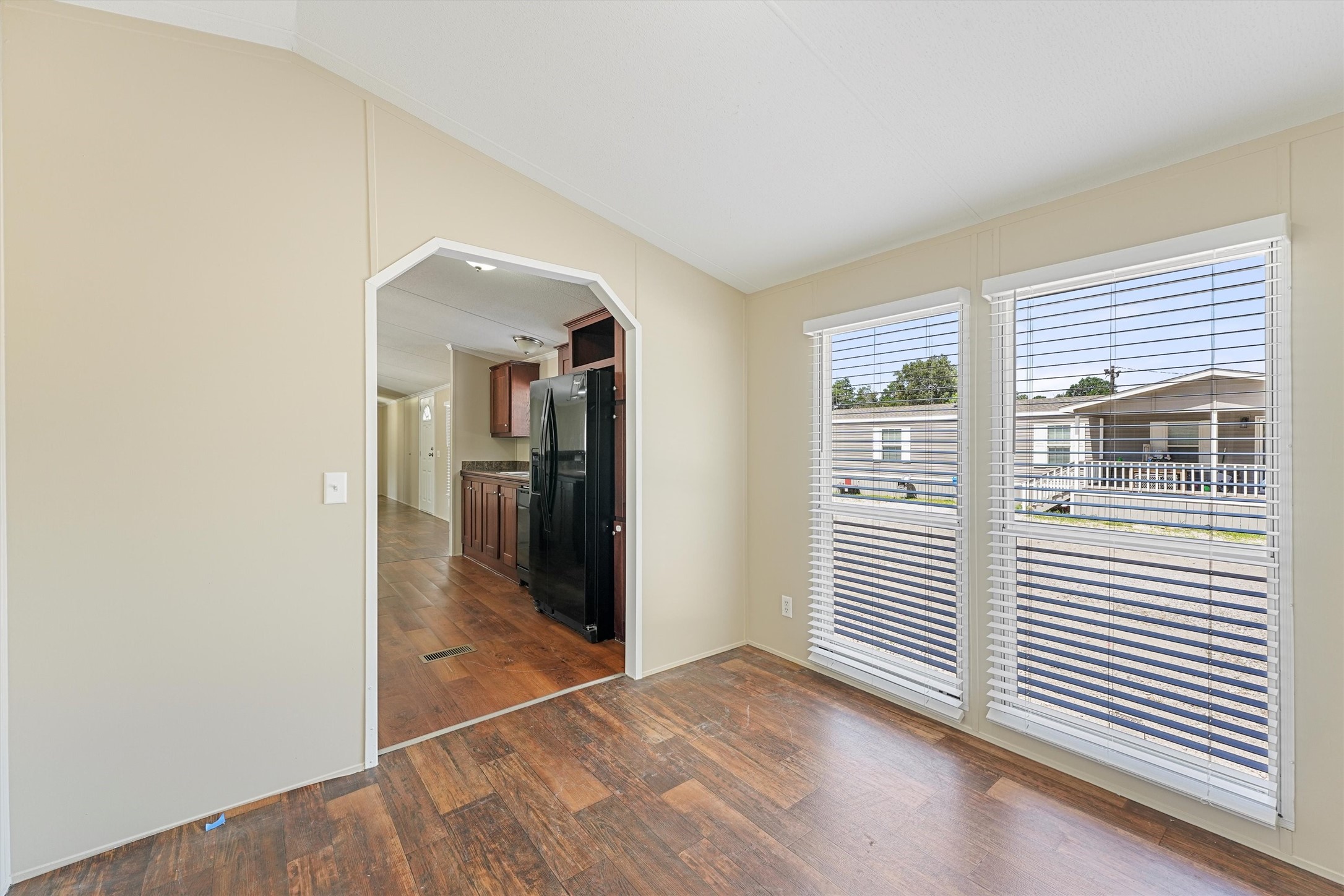 21864 Russell Drive New Caney, TX 77357 - Photo 7 of 15 a view of a livingroom with wooden floor and a window