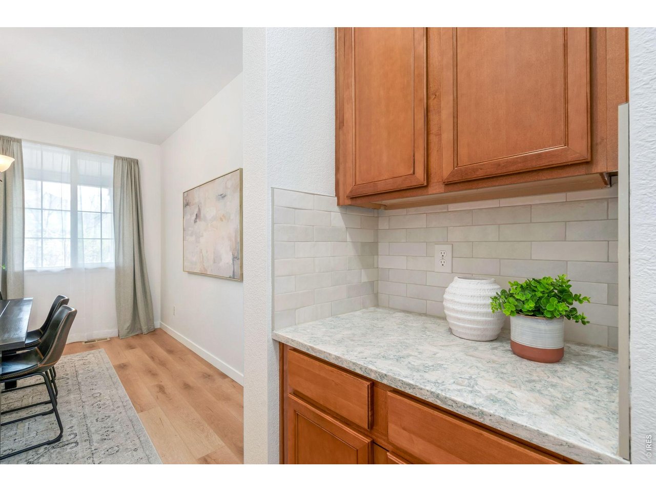 5574 Quarry Street Timnath, CO 80547 - Photo 14 of 43 a kitchen with stainless steel appliances granite countertop a sink