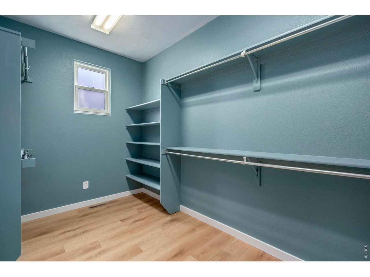 5574 Quarry Street Timnath, CO 80547 - Photo 24 of 43 a view of an empty room with a window