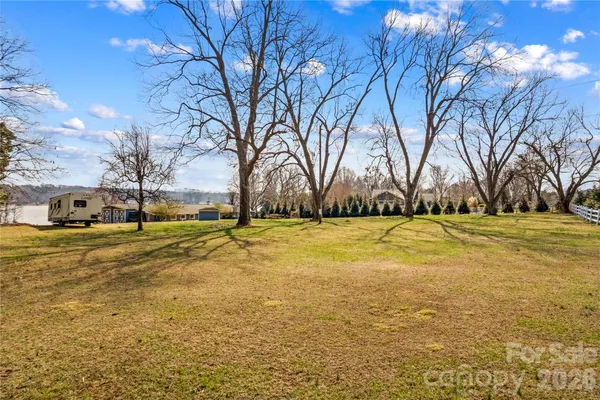 a view of yard with swimming pool