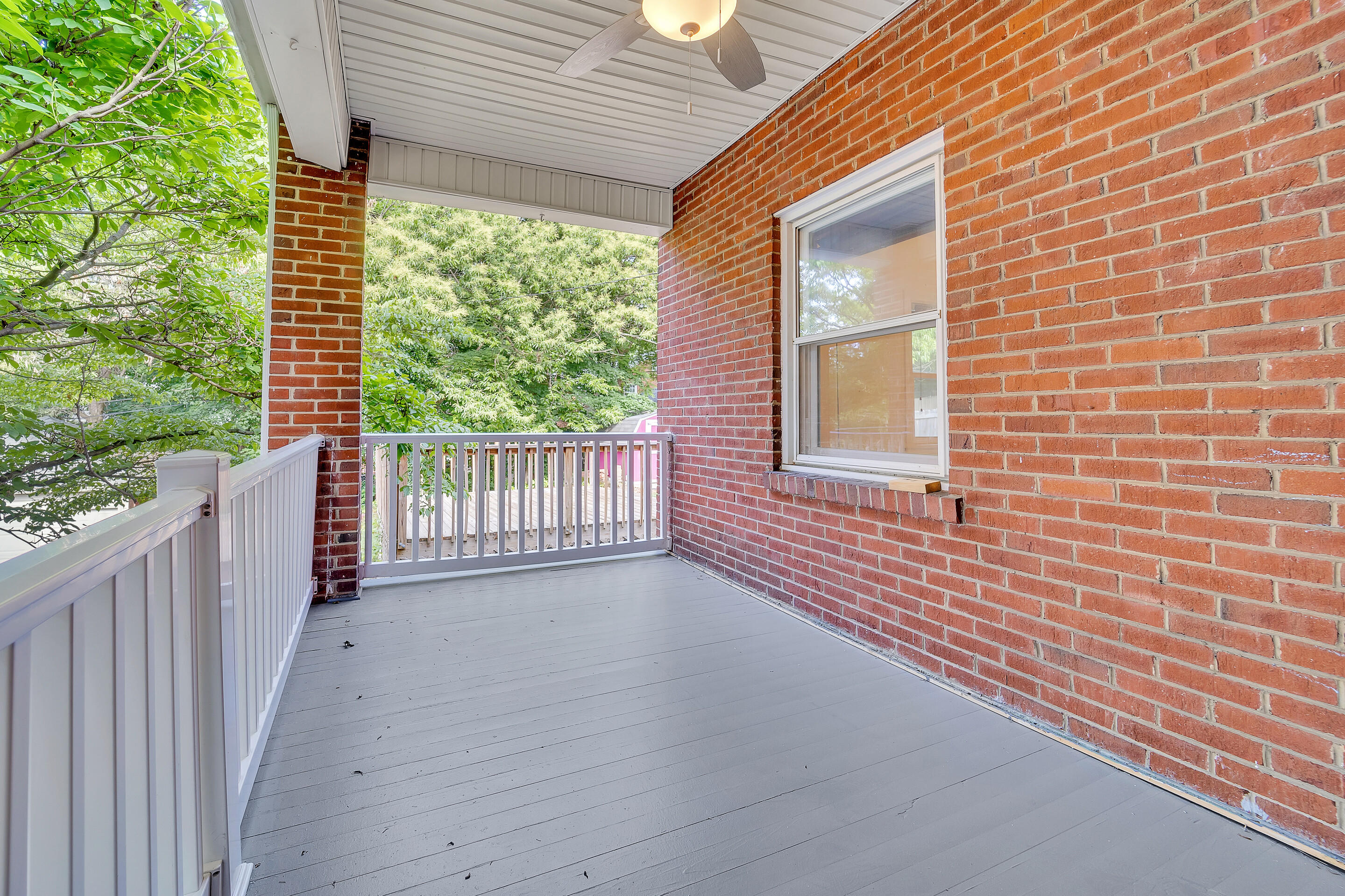 1809 Canterbury Road Southwest Roanoke, VA 24015 - Photo 12 of 29 a view of a house with porch and wooden floor