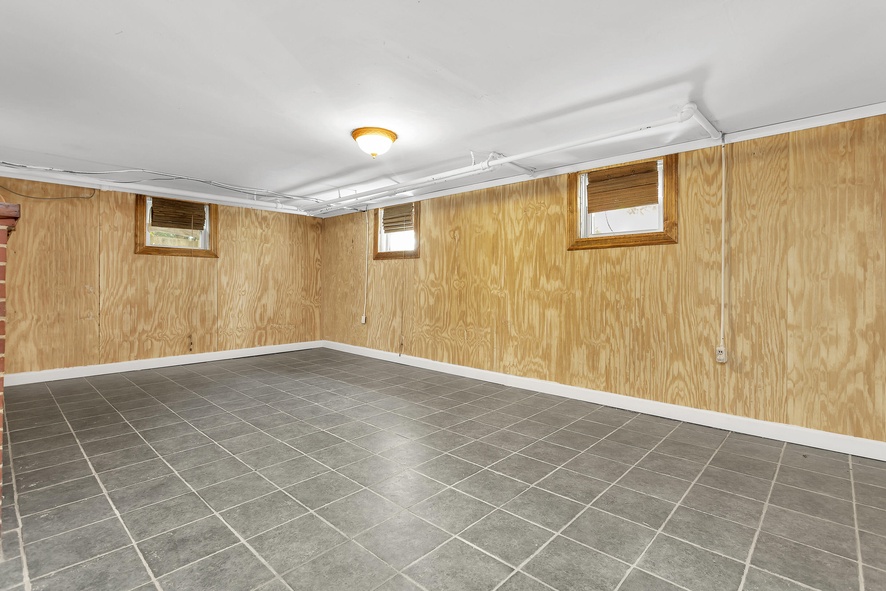 1809 Canterbury Road Southwest Roanoke, VA 24015 - Photo 26 of 29 a view of an empty room with wooden floor