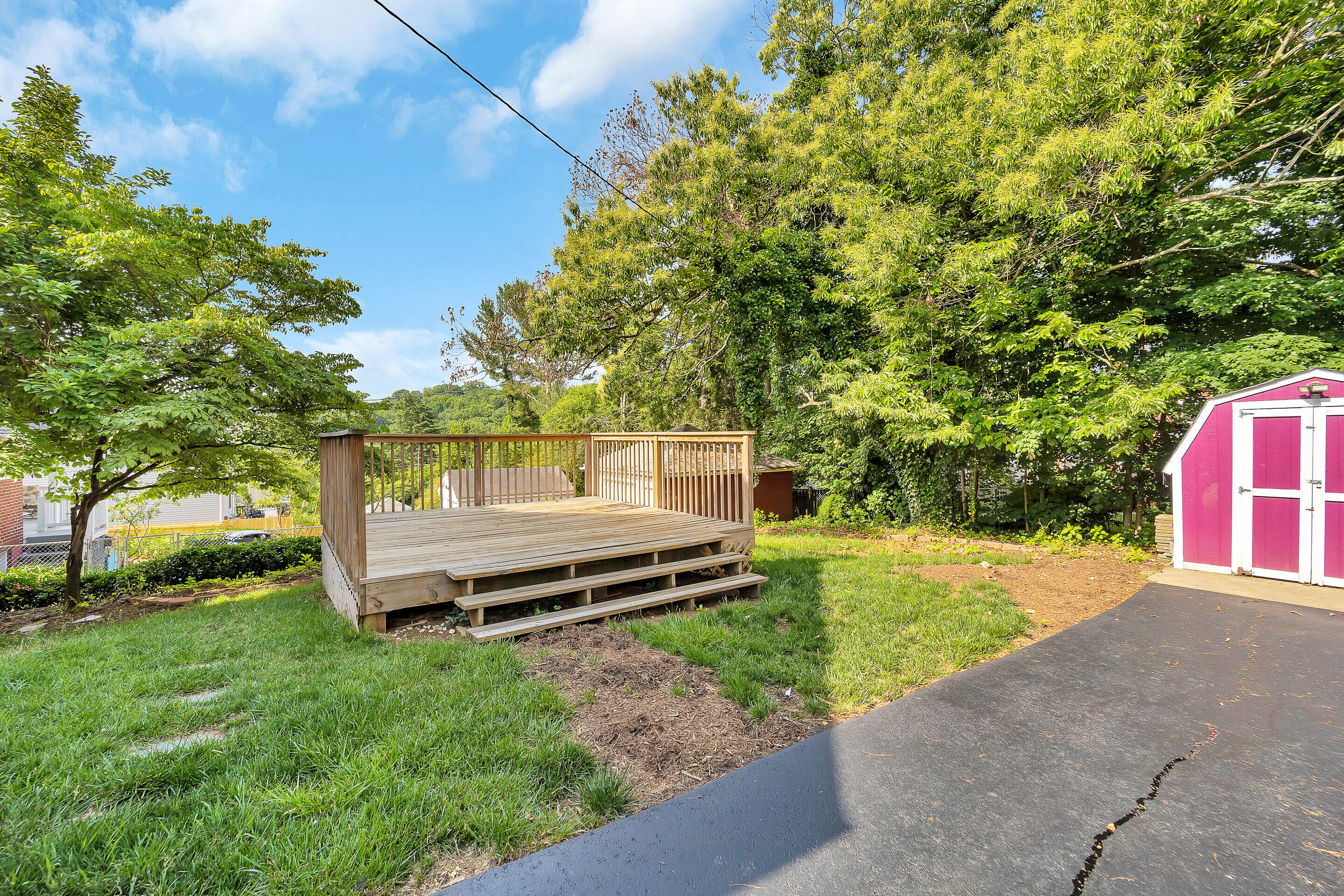 1809 Canterbury Road Southwest Roanoke, VA 24015 - Photo 28 of 29 a backyard of a house with table and chairs