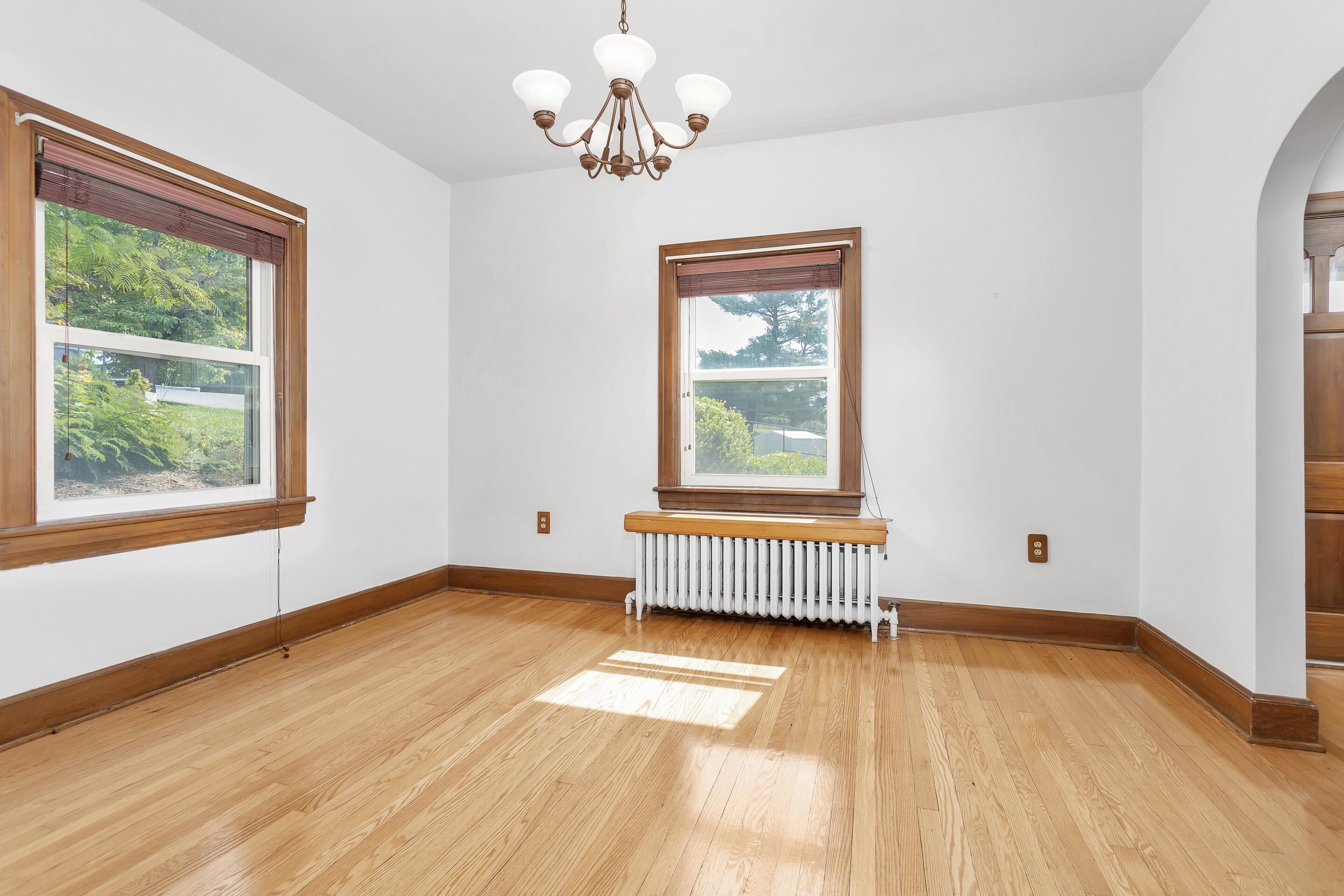 1809 Canterbury Road Southwest Roanoke, VA 24015 - Photo 7 of 29 a view of empty room with wooden floor and fan