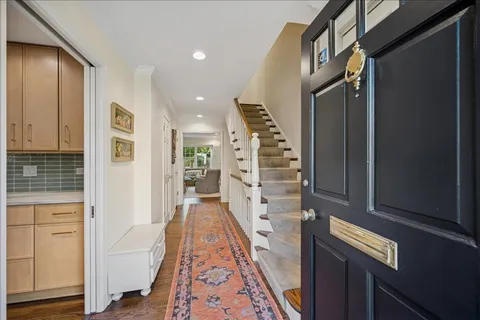 wooden floor with white walls