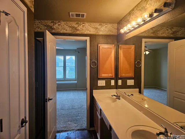 a view of a room with racks on the wall