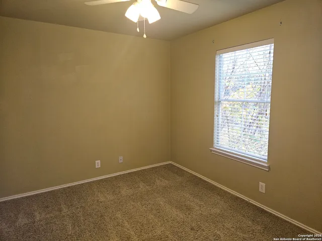 en empty room with a window