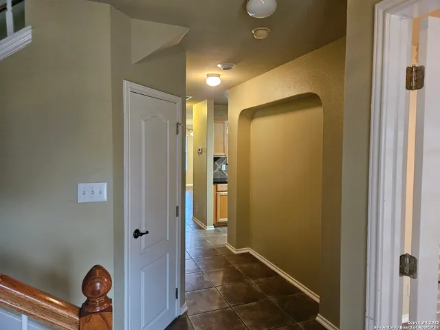 a bathroom with a mirror