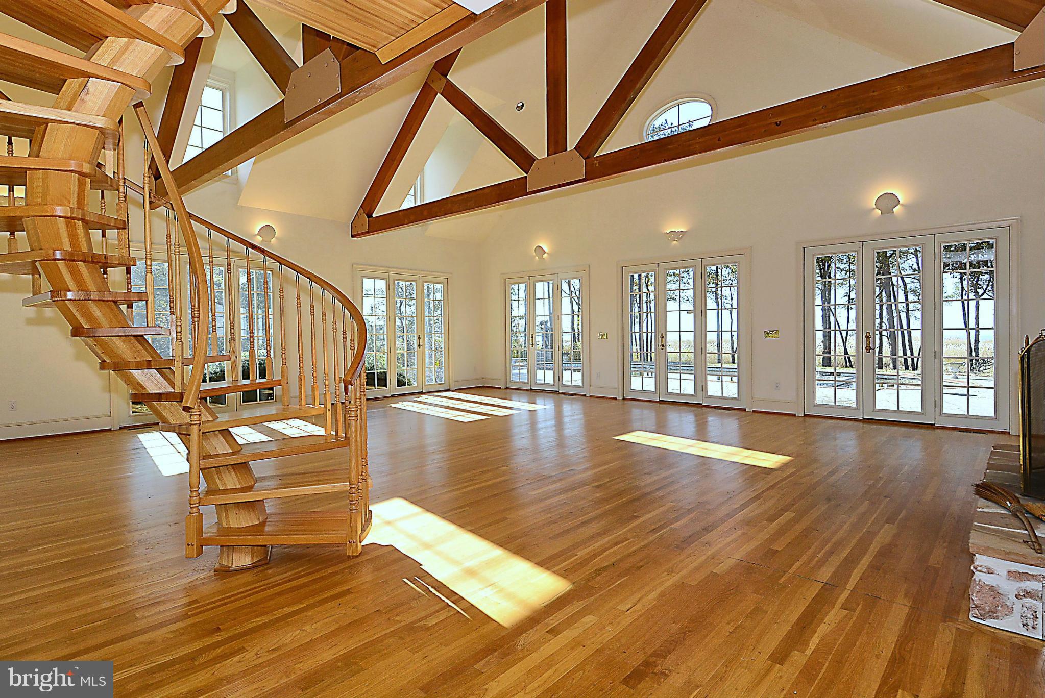 190 Wickman Way Road Chester, MD 21619 - Photo 11 of 30 a view of an entryway with wooden floor and door