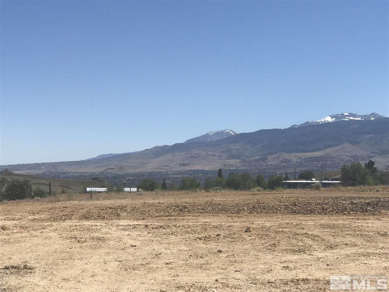 5185 Waldren Reno, NV 89506 - Photo 1 of 8 a view of a lake with mountains in the background