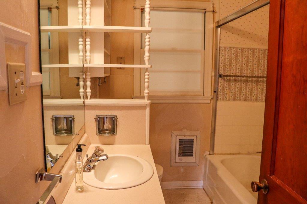 197 Silverleaf Road Southeast Floyd, VA 24091 - Photo 8 of 27 a bathroom with a sink and mirror