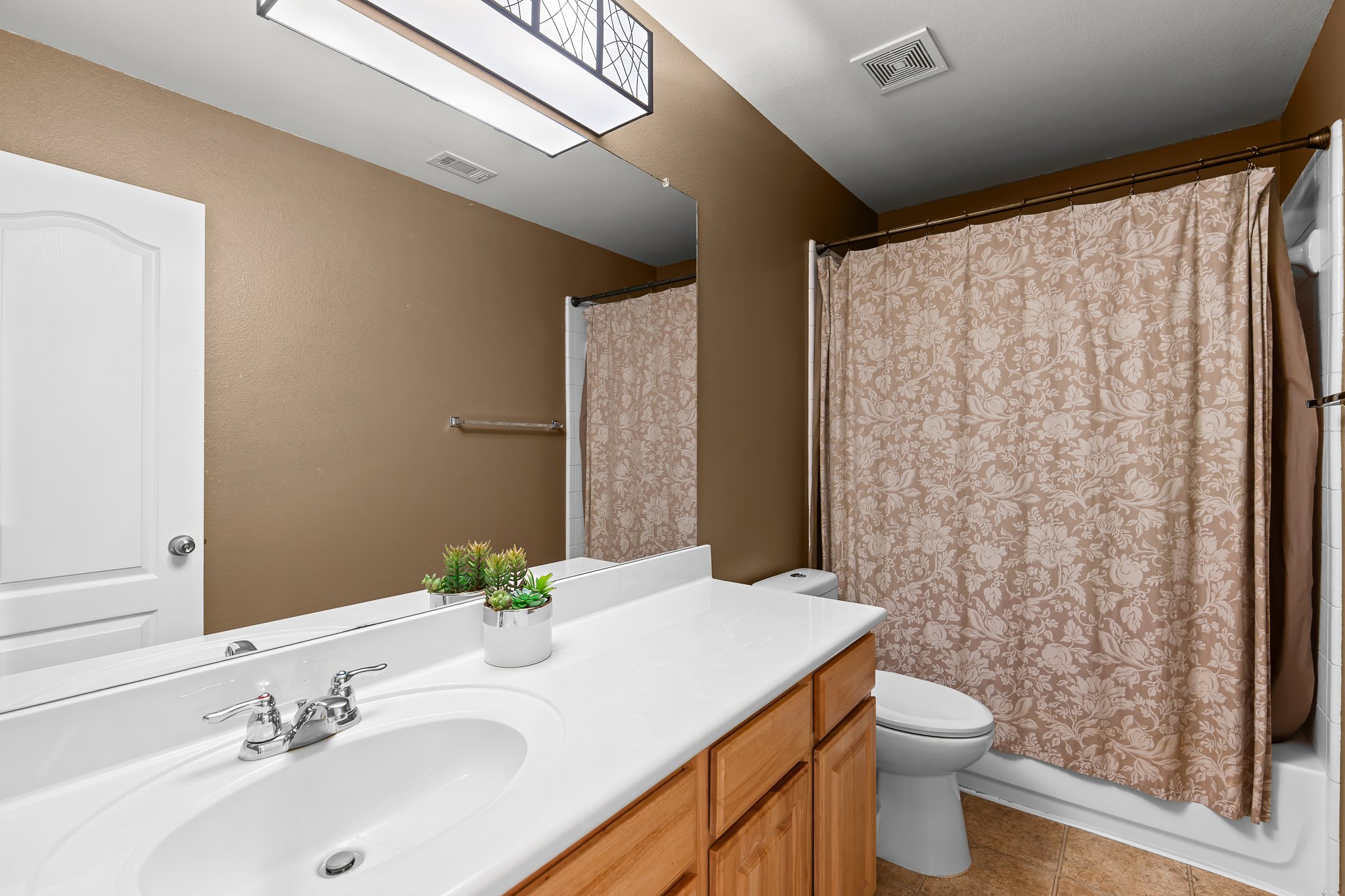 1211 Laurel Oak Trail Pflugerville, TX 78660 - Photo 34 of 40 a bathroom with a sink and a mirror