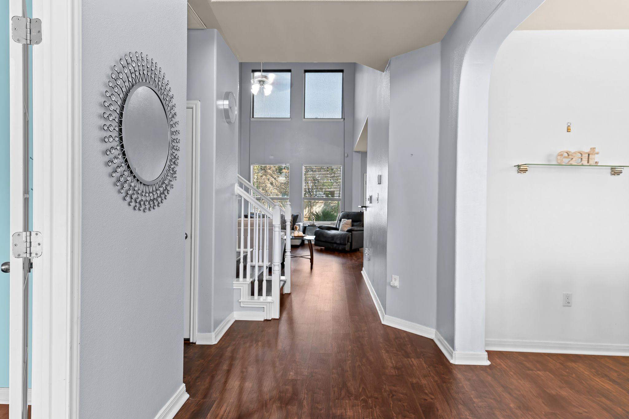 1211 Laurel Oak Trail Pflugerville, TX 78660 - Photo 4 of 40 a view of a hallway with wooden floor