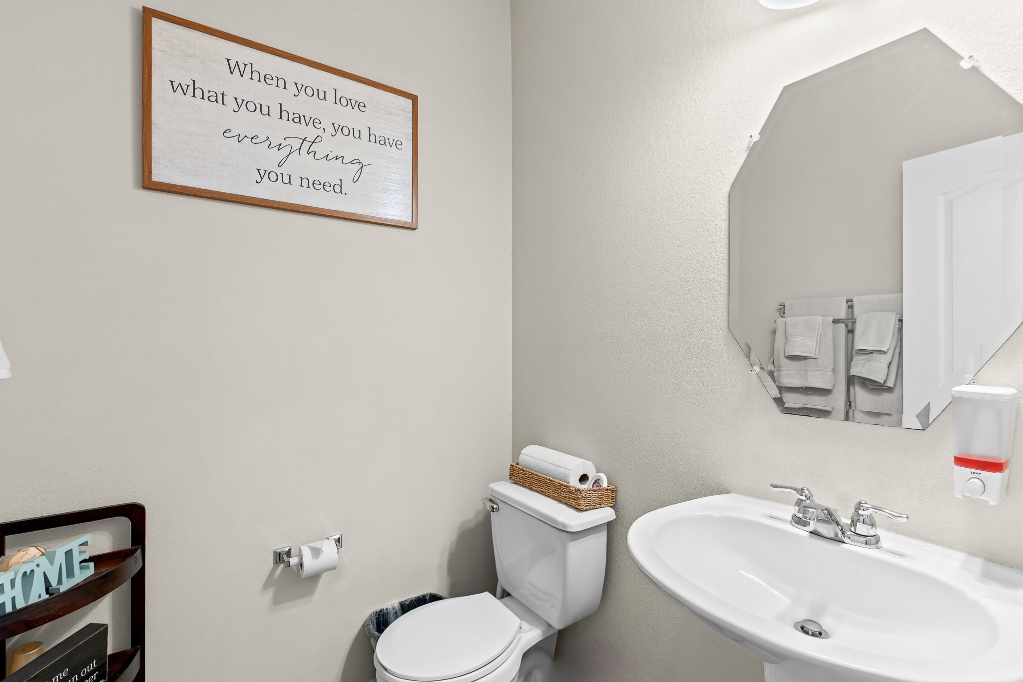 1211 Laurel Oak Trail Pflugerville, TX 78660 - Photo 9 of 40 a bathroom with a toilet sink and mirror