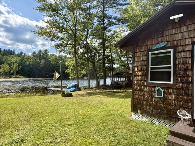 327 Sandy River Road Fayette, ME 04349 - Photo 44 of 56 Nice yard leads to the water front