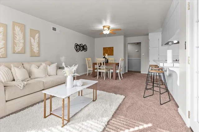 a bedroom with a bed and a couch