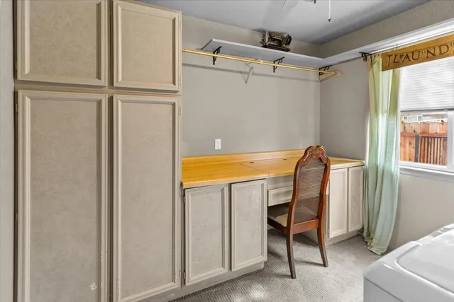 a white toilet sitting next to a shower curtain